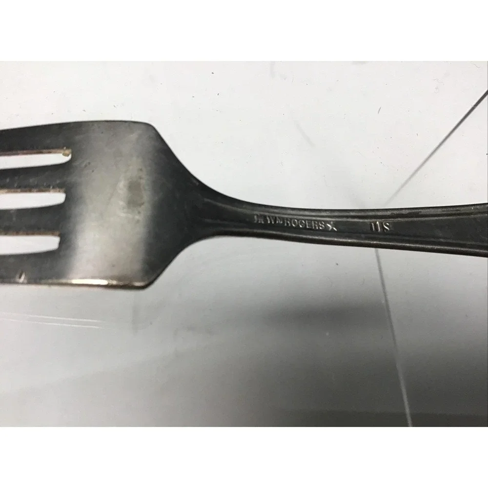 Vintage W.M. Rogers silver plate baby fork and spoon set.